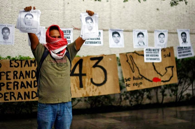 2014-10-16T010632Z_1382238887_GM1EAAG0OSV01_RTRMADP_3_MEXICO-VIOLENCE_1280_853-860x573